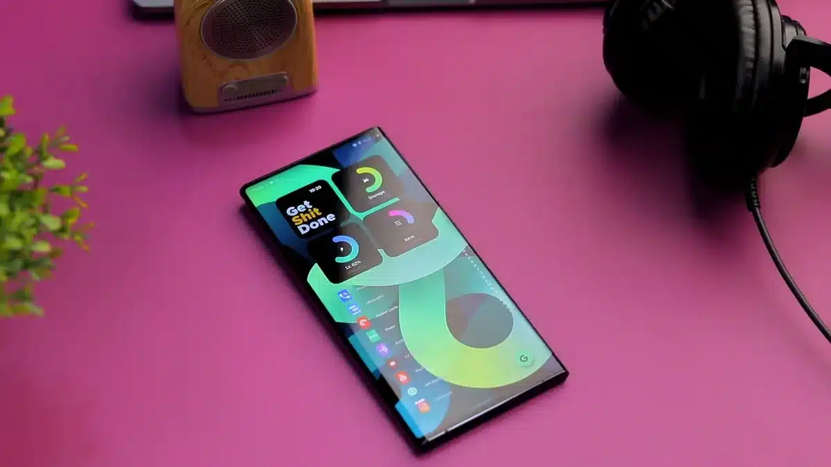 Close-up of a generic folded smartphone silhouette on a display pedestal, no logos, spotlight on hinge detail